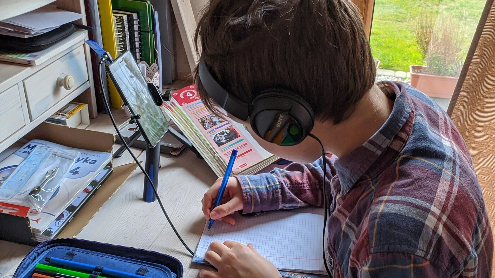 Learner listening to Arabic audio content for daily immersion practice